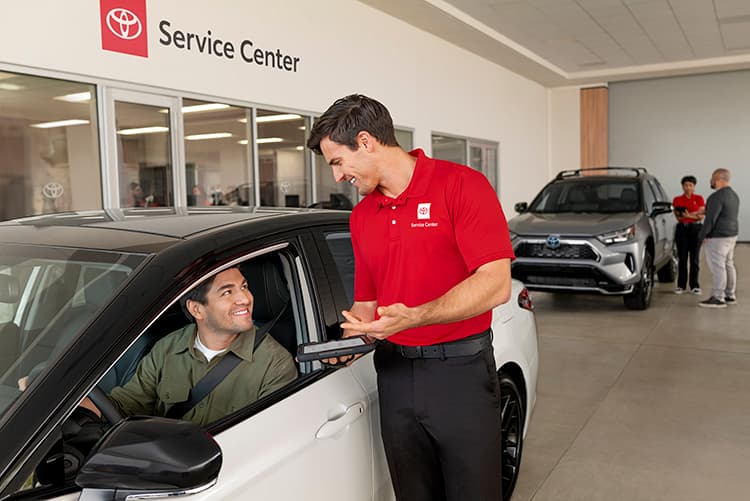 Toyota Technician Working On A Toyota Vehicle